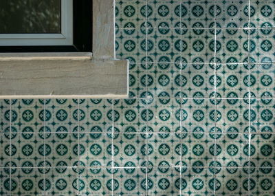 Close-up of window on floor in building