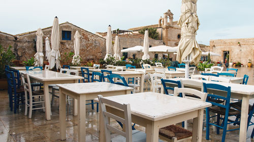 Outdoor table of a restaurant in the main square of marzamemi