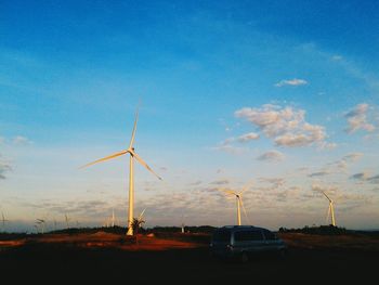 Windmills on landscape