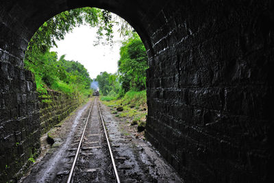 View of railroad tracks in tunnel