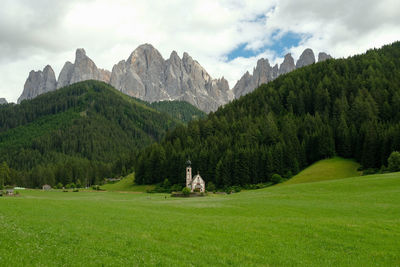 Scenic view of landscape and mountains against sky