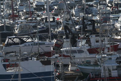 High angle view of boats moored at harbor