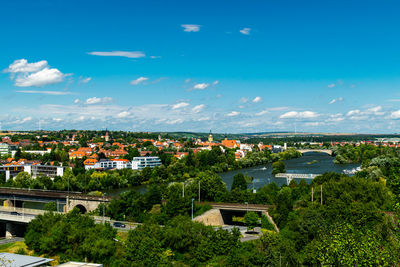 High angle view of townscape against blue sky