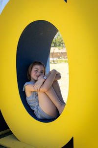 Portrait of a smiling girl in playground