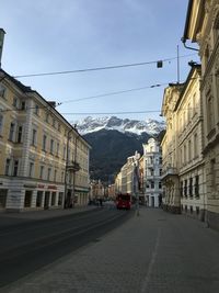 Road with buildings in background