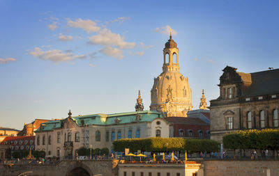 View of buildings in city against sky