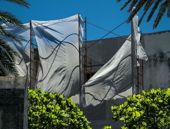 Low angle view of built structure against blue sky