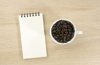 High angle view of coffee cup on table
