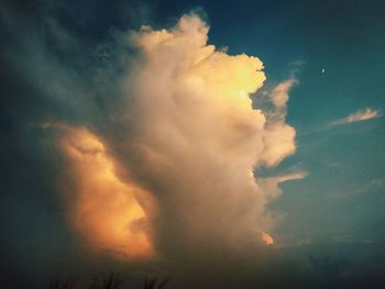 Low angle view of dramatic sky during sunset