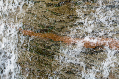 Full frame shot of water splashing against sky