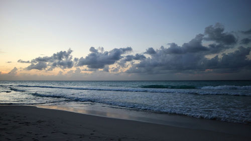 Scenic view of sea against sky during sunset