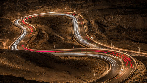 High angle view of light trails on road