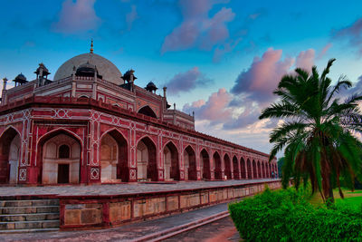 View of historical building against cloudy sky