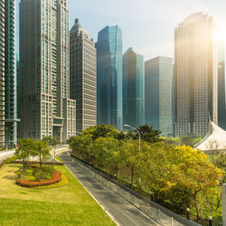 Modern buildings in city against sky