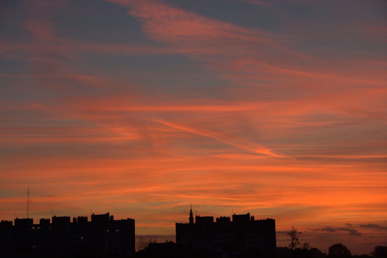 VIEW OF CITY AT SUNSET