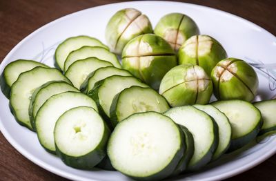 High angle view of fruits in plate on table