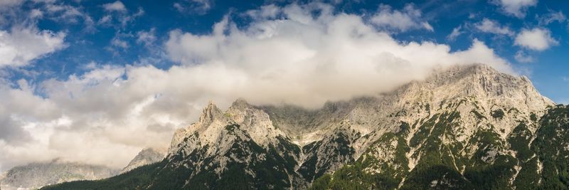 Panoramic view of majestic mountains against sky