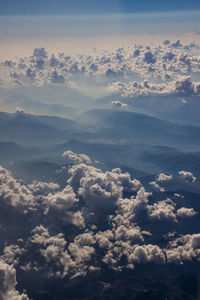 Scenic view of landscape against cloudy sky