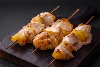 Close-up of sushi on cutting board