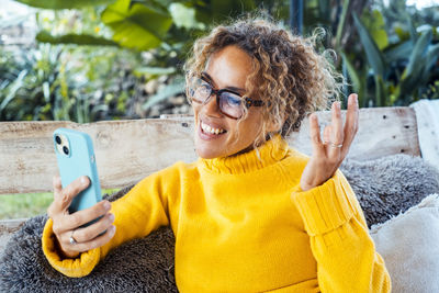 Young woman using mobile phone