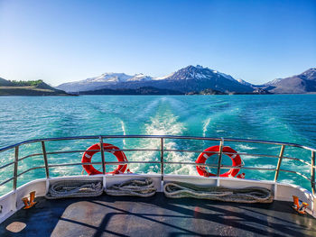 Scenic view of sea against clear blue sky