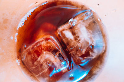 High angle view of drink in glass on table