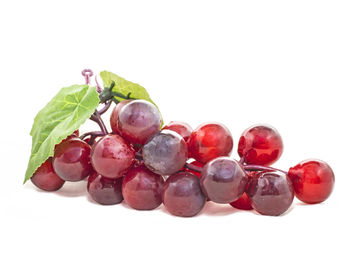 Close-up of fruits against white background