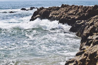 View of rock formation in sea