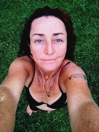 Portrait of beautiful woman in field