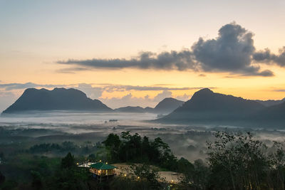 Scenic view of mountains against sky during sunset