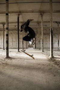 Full length of man skateboarding on skateboard