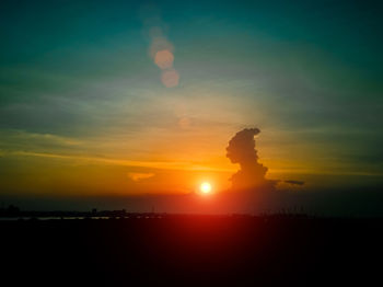 Scenic view of sunset over sea