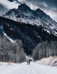 Scenic view of snow covered mountains