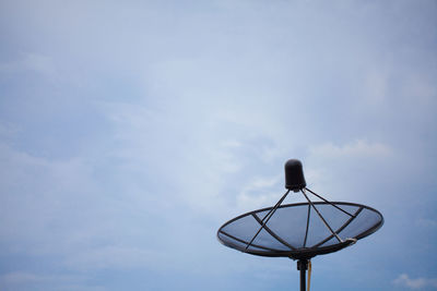 Low angle view of satellite dish against sky