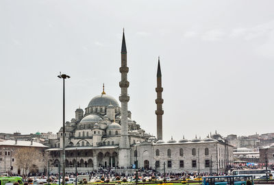 View of buildings in city against sky