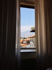 Buildings seen through window