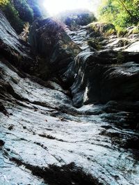 Scenic view of river amidst mountains