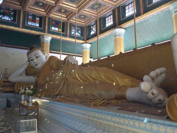 Statue of buddha in building