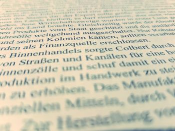Close-up of text on book