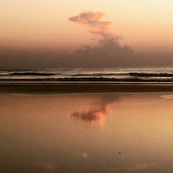 Scenic view of sea at sunset