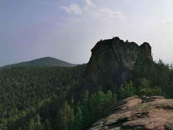 Scenic view of rocky mountains against sky