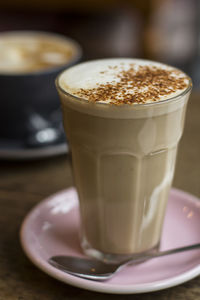 Close-up of coffee cup on table