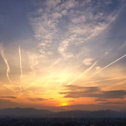 Scenic view of dramatic sky during sunset