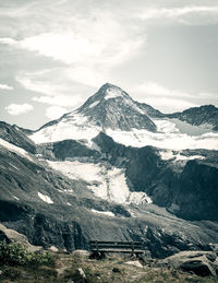 Scenic view of snowcapped mountains against sky
