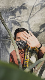 Low angle view of woman sitting on beach