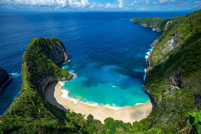 Panoramic view of sea against cloudy sky at nusa penida, bali. 