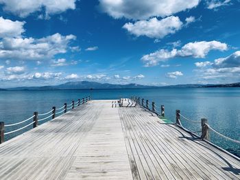 Pier over sea against sky