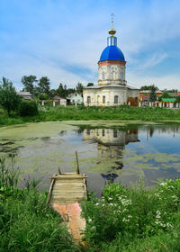 View of historic building against cloudy sky