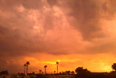 Low angle view of cloudy sky at sunset