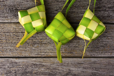 High angle view of green leaves on table